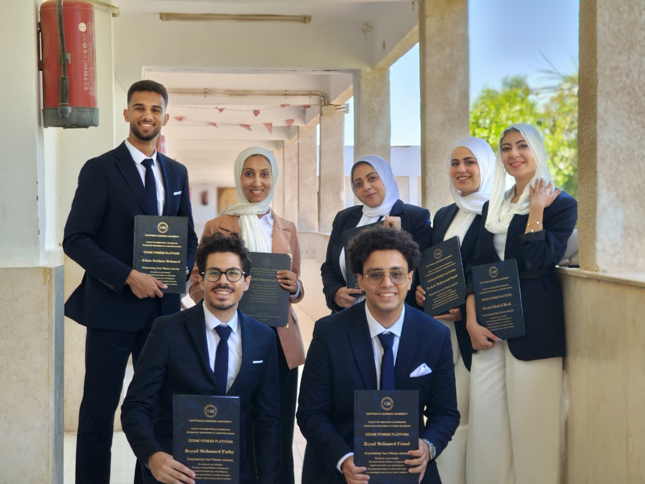 Ozone team receiving awards at graduation ceremony